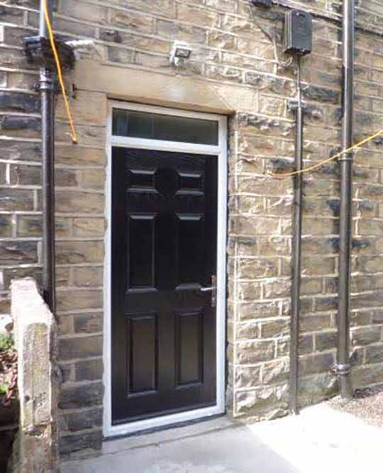 black cottage style composite front door