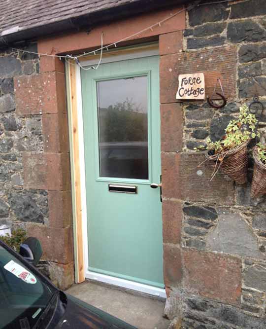 glazed glazed cottage composite front door in chartwell green